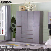A gray Noble Cupboard with model number BFC009 displayed in a room setting, featuring multiple doors and drawers with a modern design.